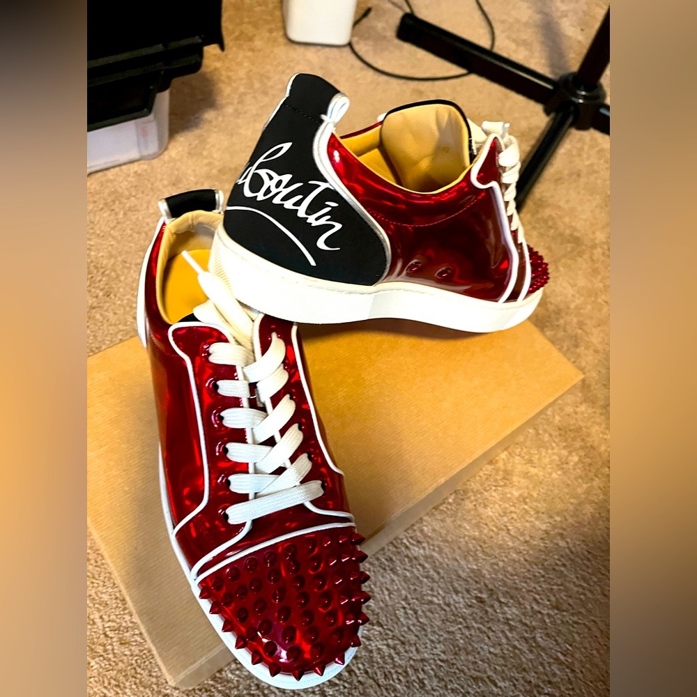 Red and black low top, Christian Louboutin‘s